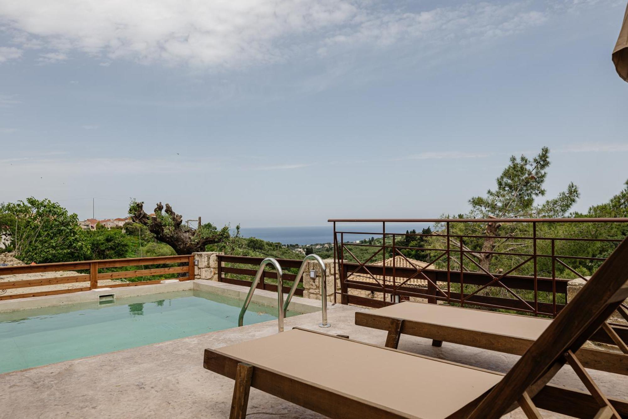 Vozas Villas - Traditional Houses With Great View Tragaki Bagian luar foto